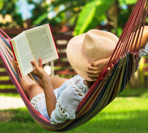 Woman reading in hammock.png